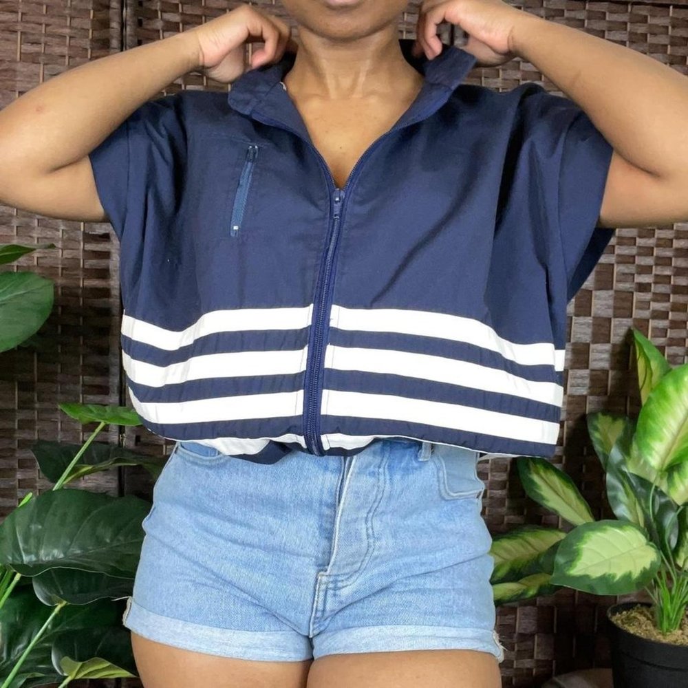 NOT FOR SALE vintage 80’s navy and white muscle windbreaker‎